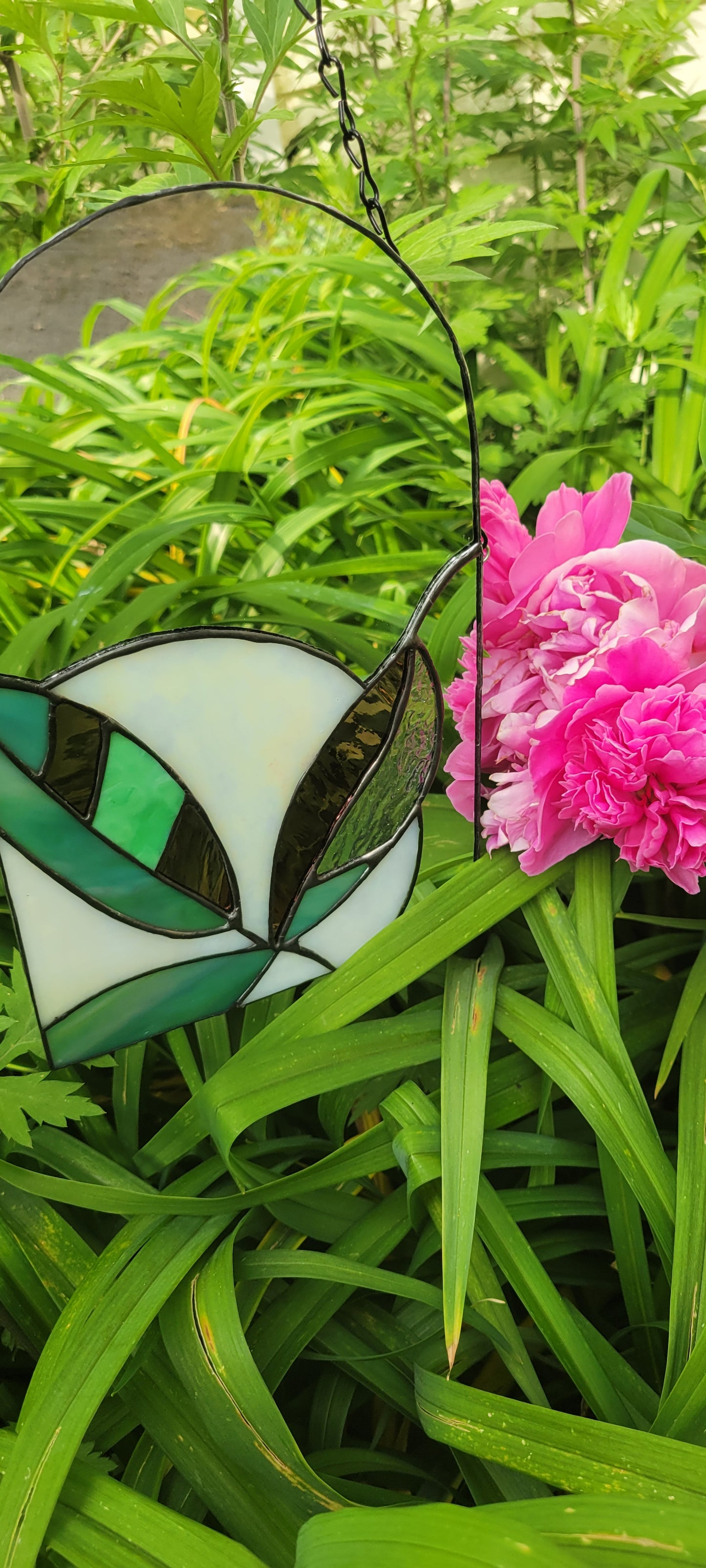 Stained glass mirror with moon and plants