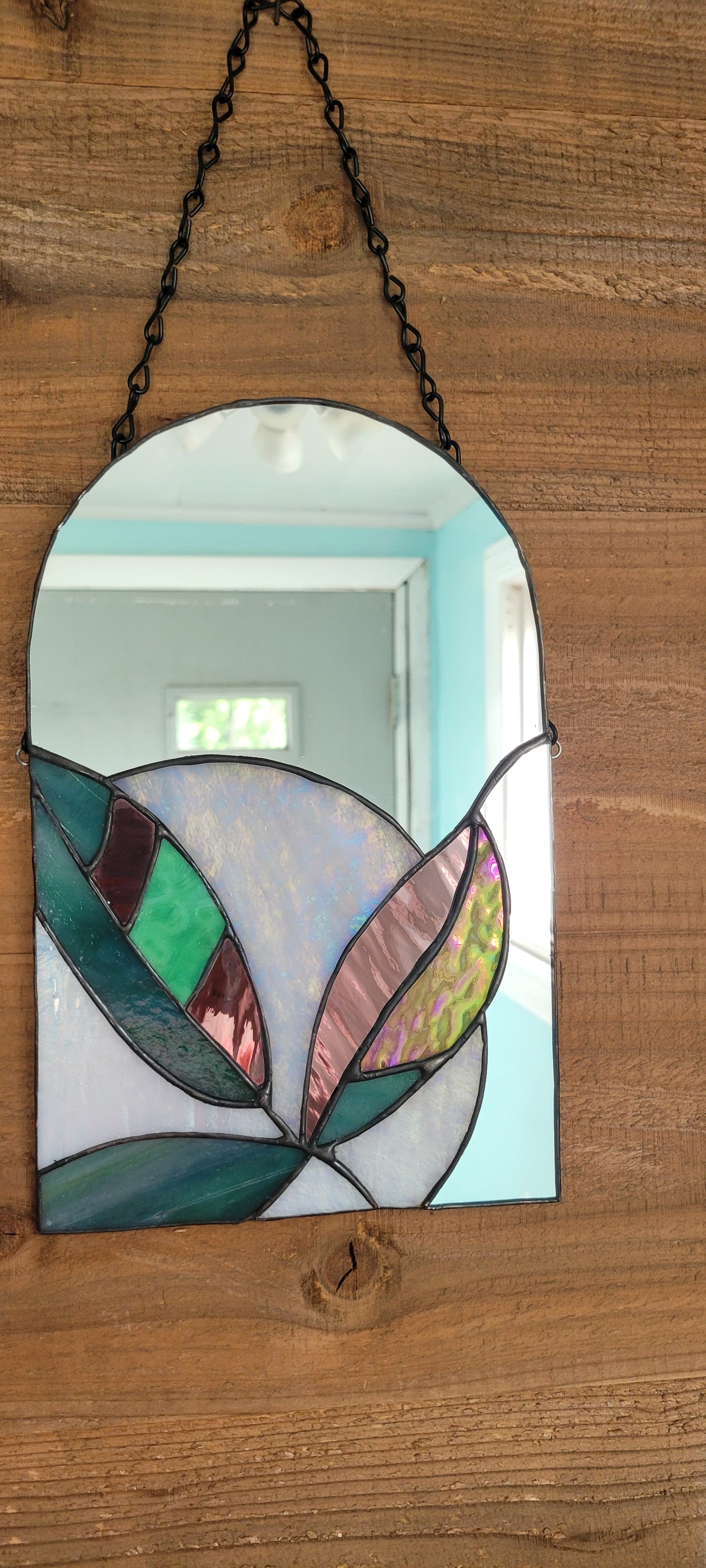 Stained glass mirror with moon and plants