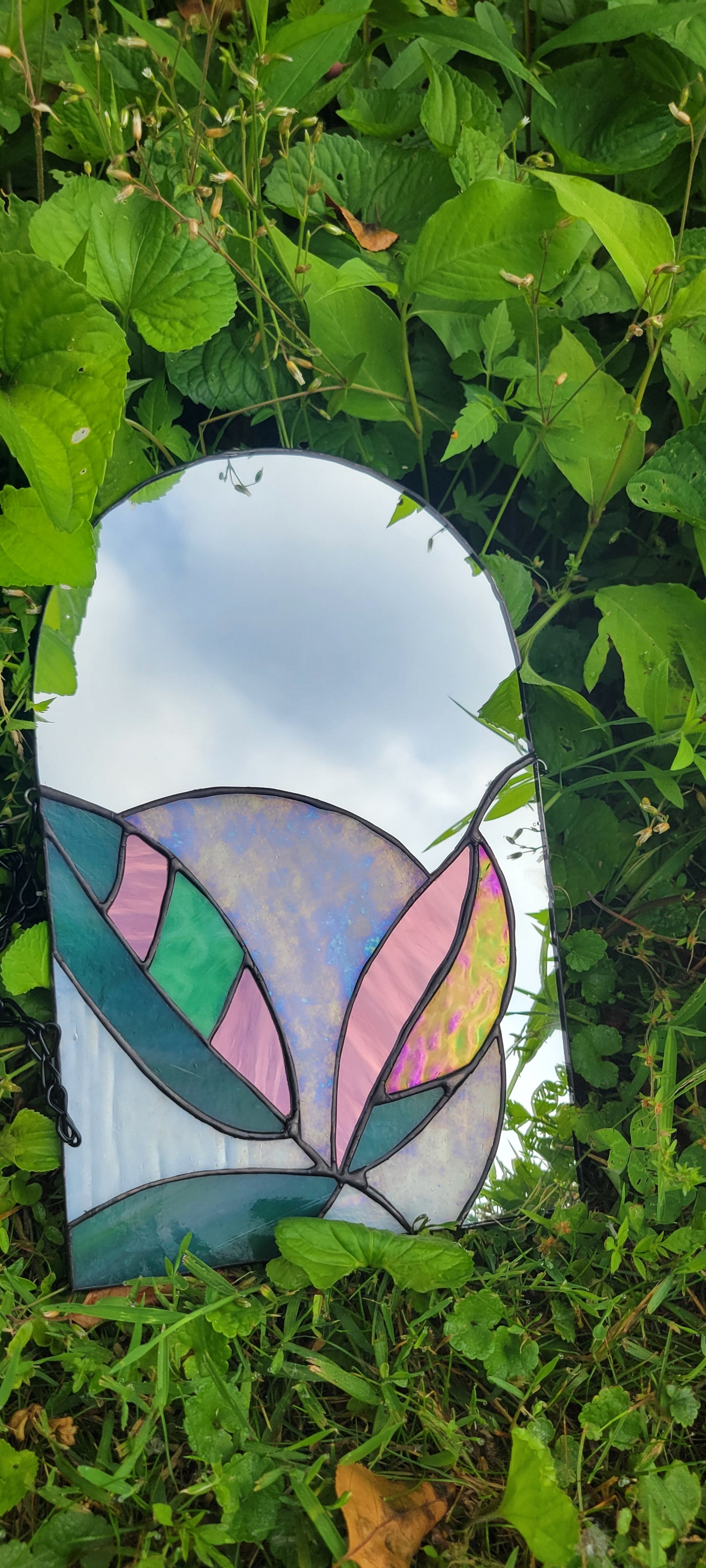 Stained glass mirror with moon and plants