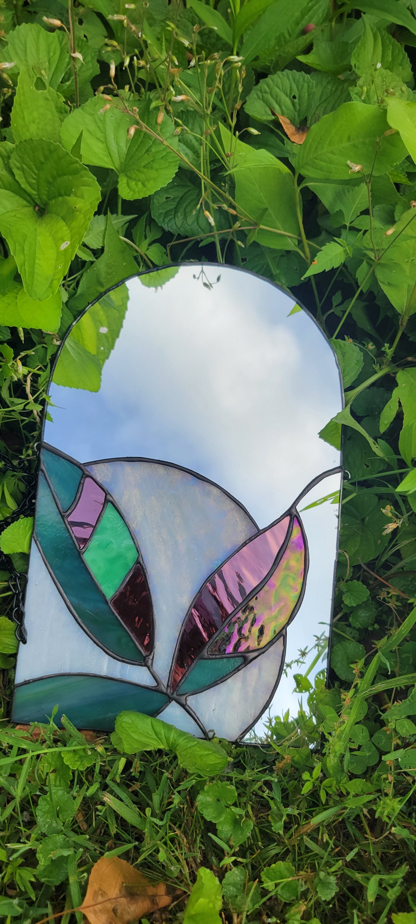 Stained glass mirror with moon and plants
